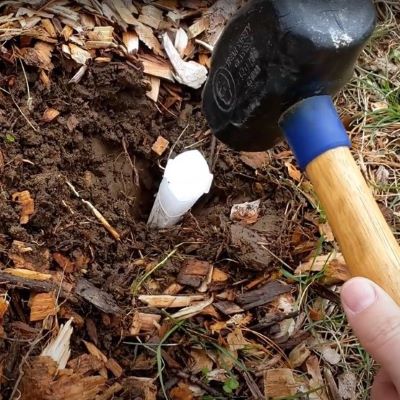 Jobes Citrus Fertilizer Spike add plastic cap and hammer in