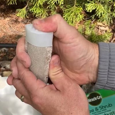 Miracle Gro Tree Spike push cap onto spike