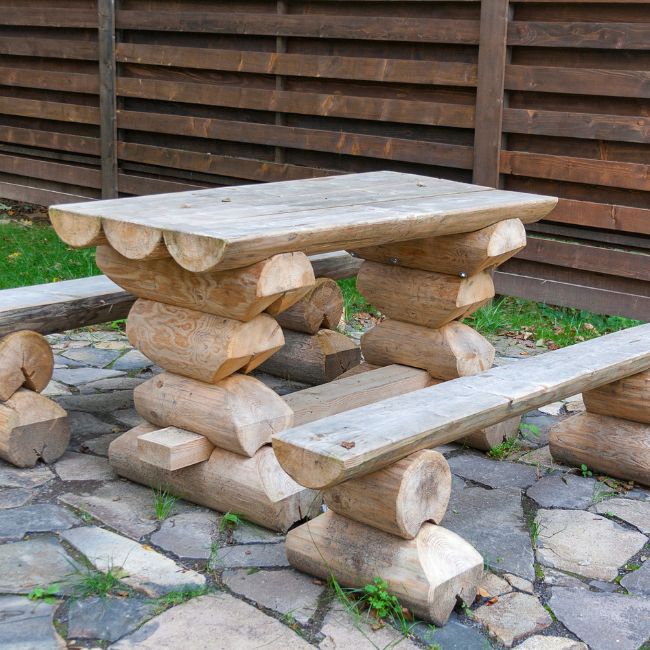 table made from tree stumps